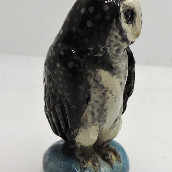 Miniature ceramic sooty owl sculpture 