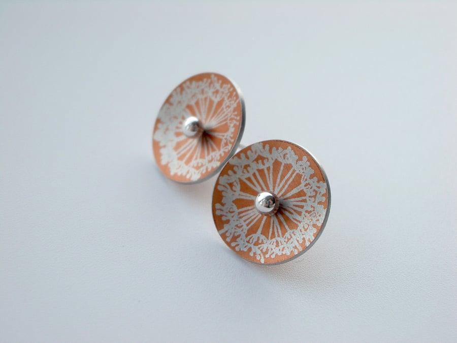 Orange and silver dandelion clock studs