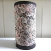 Ceramic vase, black clay dappled with pink and white.  Handmade and decorated.