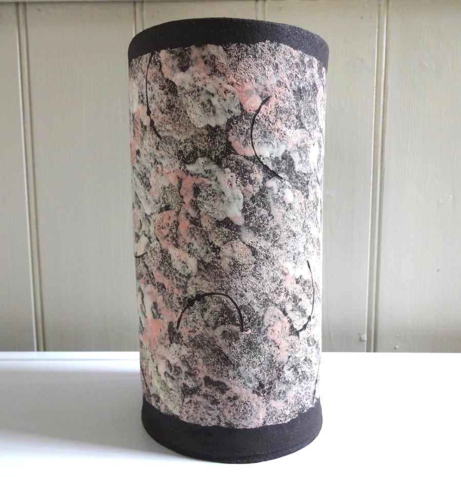 Ceramic vase, black clay dappled with pink and white.  Handmade and decorated.