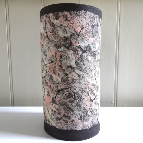 Ceramic vase, black clay dappled with pink and white.  Handmade and decorated.