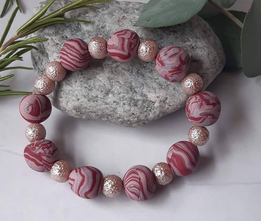 Pretty handmade raspberry and pink polymer clay bracelet