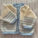 Sparkly cream baby cardigan with blue stripes