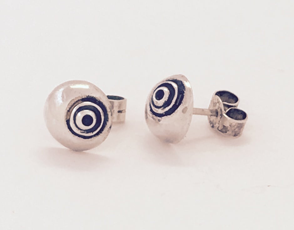 Round silver stud earrings with oxidised detail