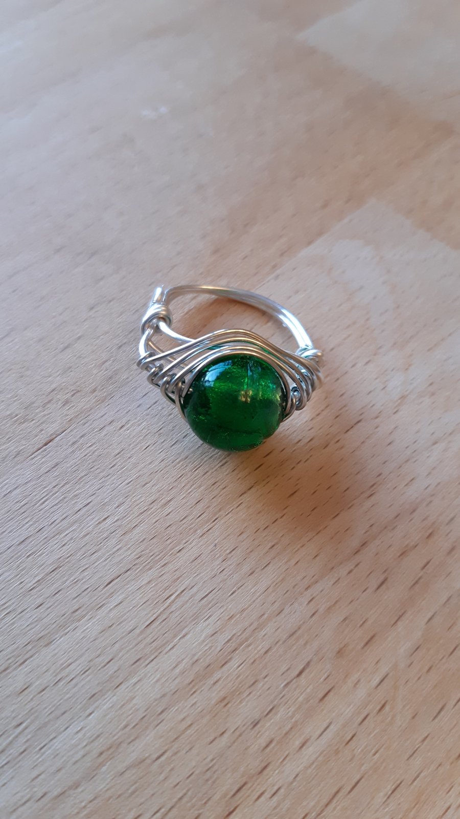 Green herringbone ring