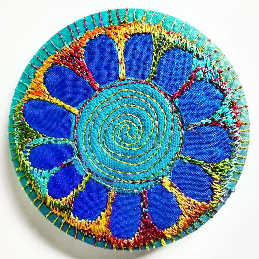 58mm Fabric Badge with Free Machine Embroidery Blue and Turquoise Flower 