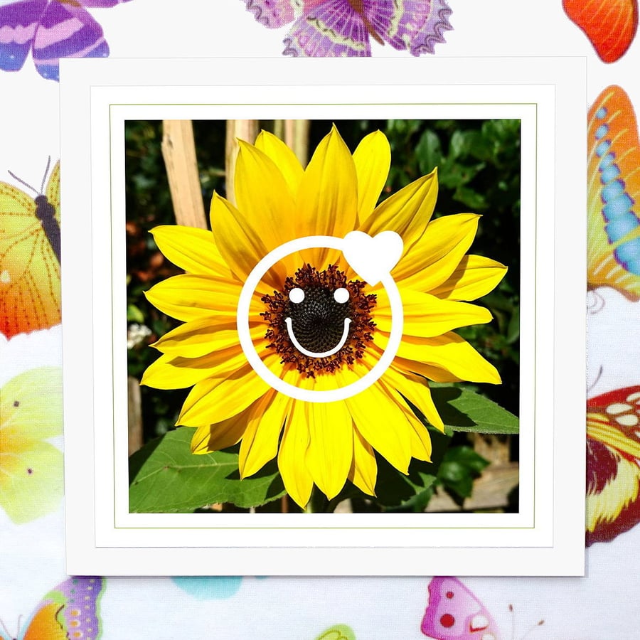'Smiling sunflower with emoji' greeting card with free sunflower seeds