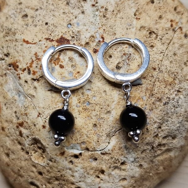 Black Spinel huggie hoop earrings. August Birthstone. Reiki jewelry uk