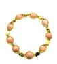 Rhodochrosite stretchy bracelet with gold coloured connectors