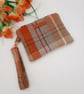 Check clutch bag with clip on handle and flower applique.  - Image 7