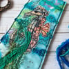 Embroidered 100% up-cycled seahorse bookmarks.  