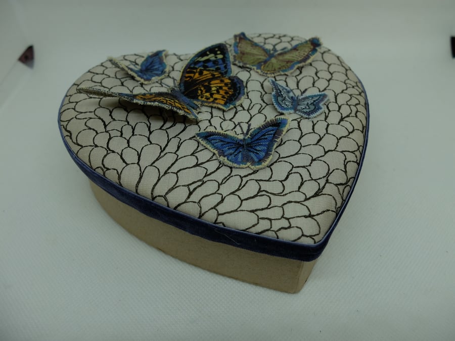 Large heart shaped gift box with butterflies on lid
