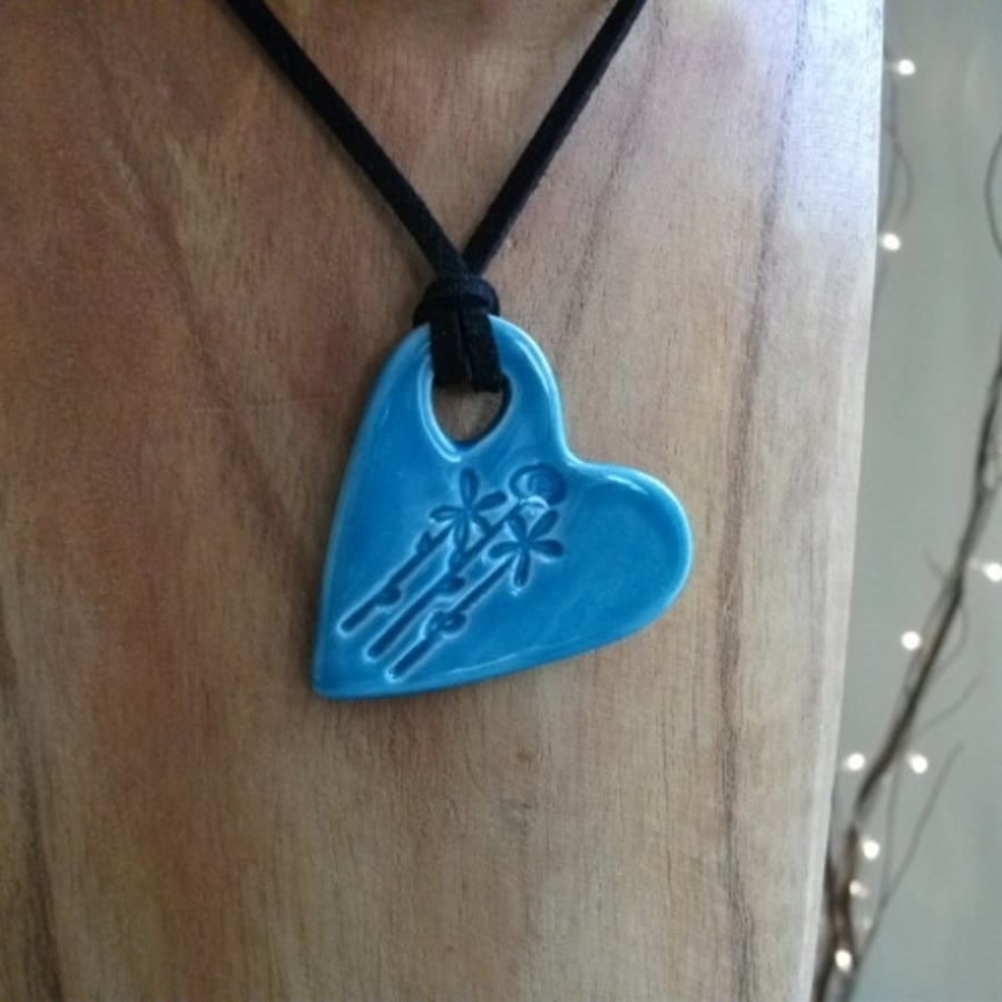 Large CeramicTurquoise Pendant Heart Necklace Impressed with  flowers.