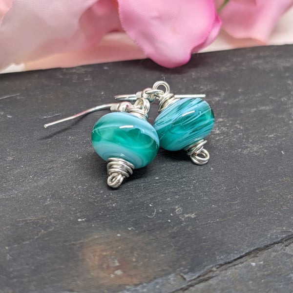 Green and white lamp work glass bead and silver plated wire work earrings 