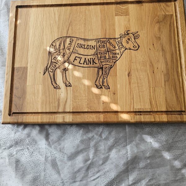 Large oak chopping board 48x35x4cm cow with beef cuts design laser engraved.