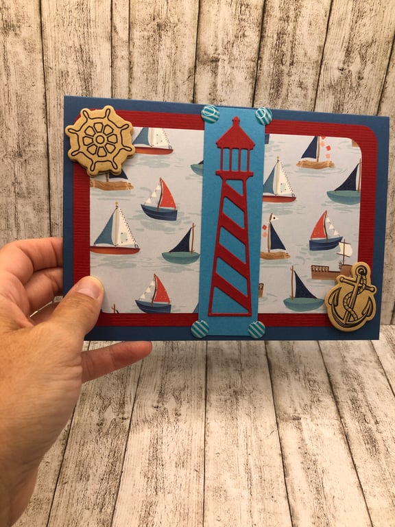 Sailing themed card with boats and lighthouse 
