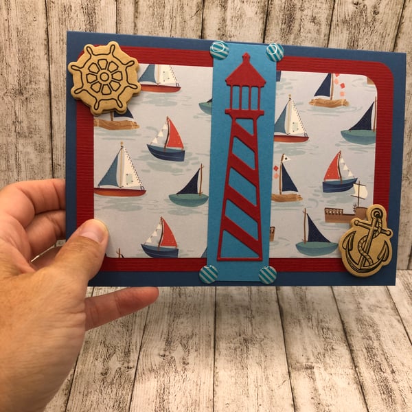 Sailing themed card with boats and lighthouse 