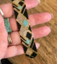 Geometric beadwork peyote bracelet in black and gold with slider chain  - Image 6