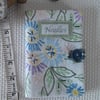 Sewing needle case with repurposed embroidery green
