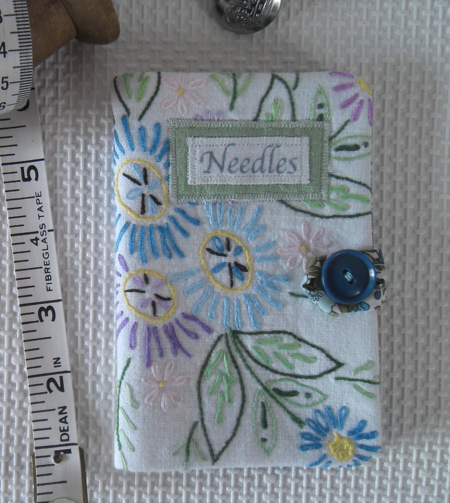 Sewing needle case with repurposed embroidery green
