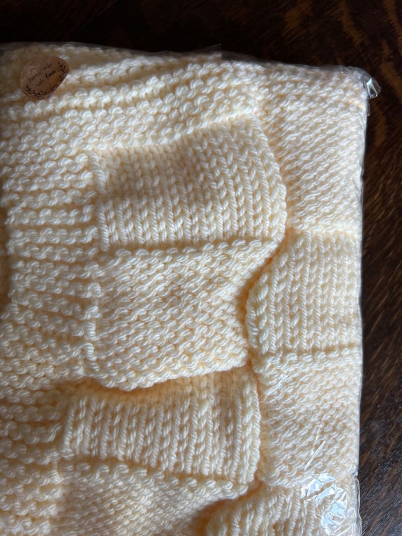 Beautiful cream baby blanket handknitted in Hayfield Baby Chunky wool