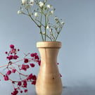 Small, wooden bud vase – for dried flowers.