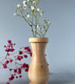 Small, wooden bud vase – for dried flowers.