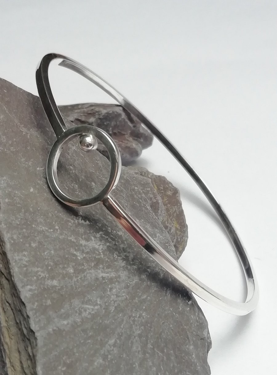 Silver Bangle with a Ring And Ball Detail