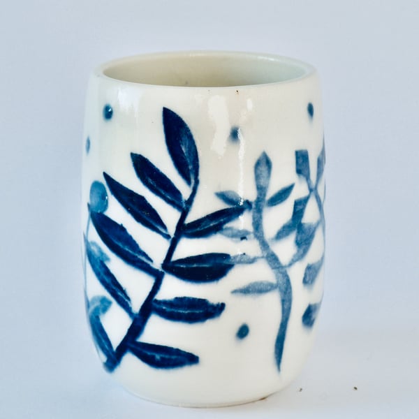 A pretty little porcelain posy vase made by Linda in her pottery in Winchester