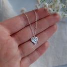 Dainty love heart necklace in hammered recycled sterling silver