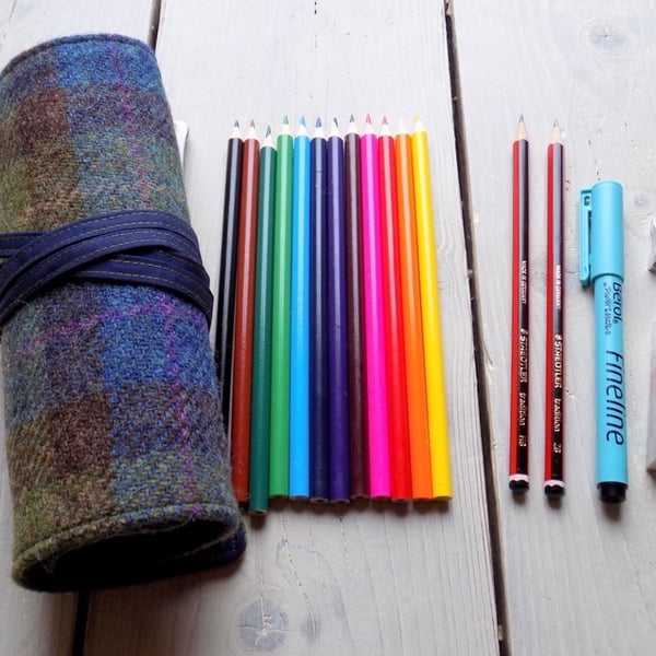 Harris Tweed pencils roll in blue, olive green and brown. Includes pencils