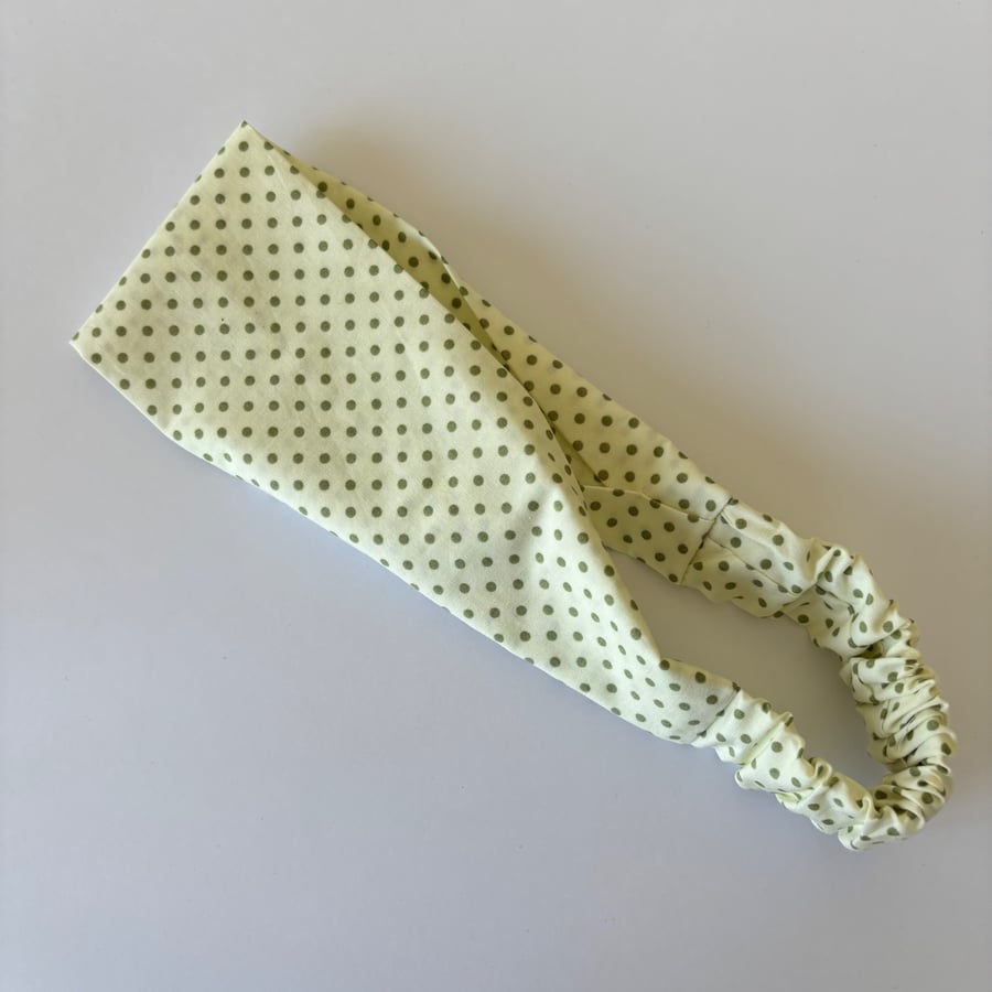 Cotton wide flat headband, yoga headband, in cream with green polka dots