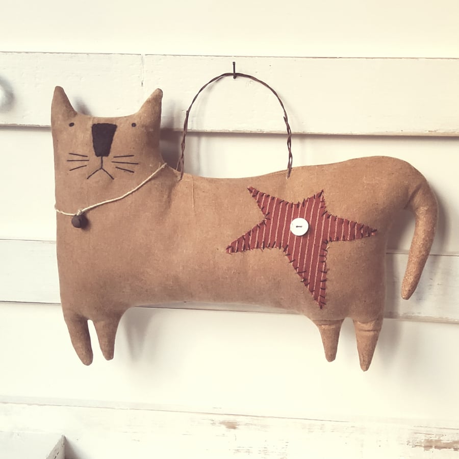 Primitive hanging cat