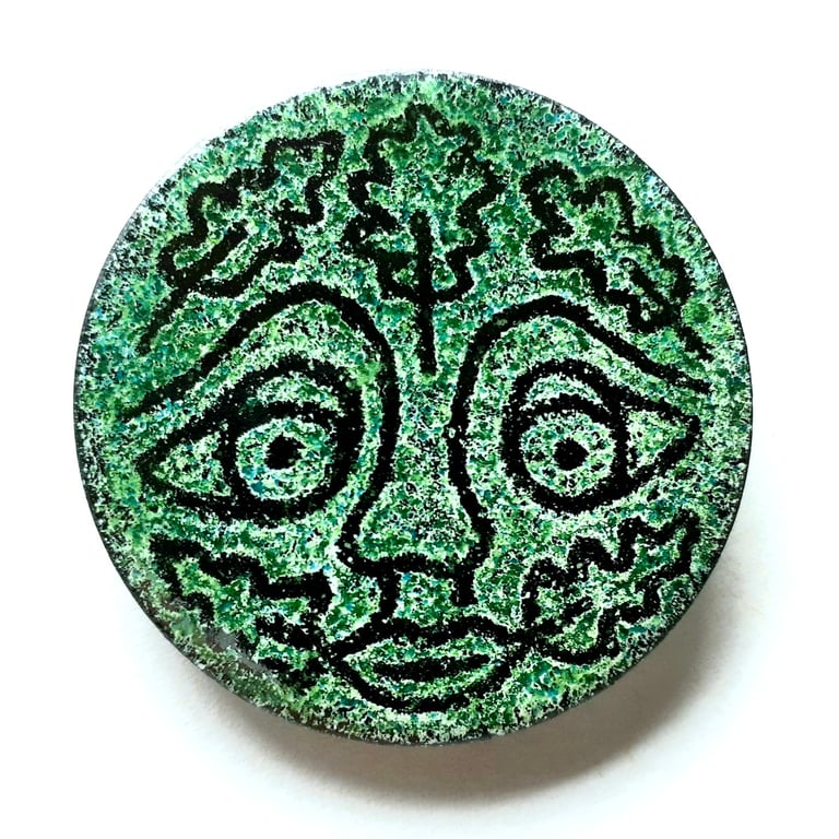 Green Man Brooch - a 'Green Man' Design Circular Brooch in Green & Black Enamels