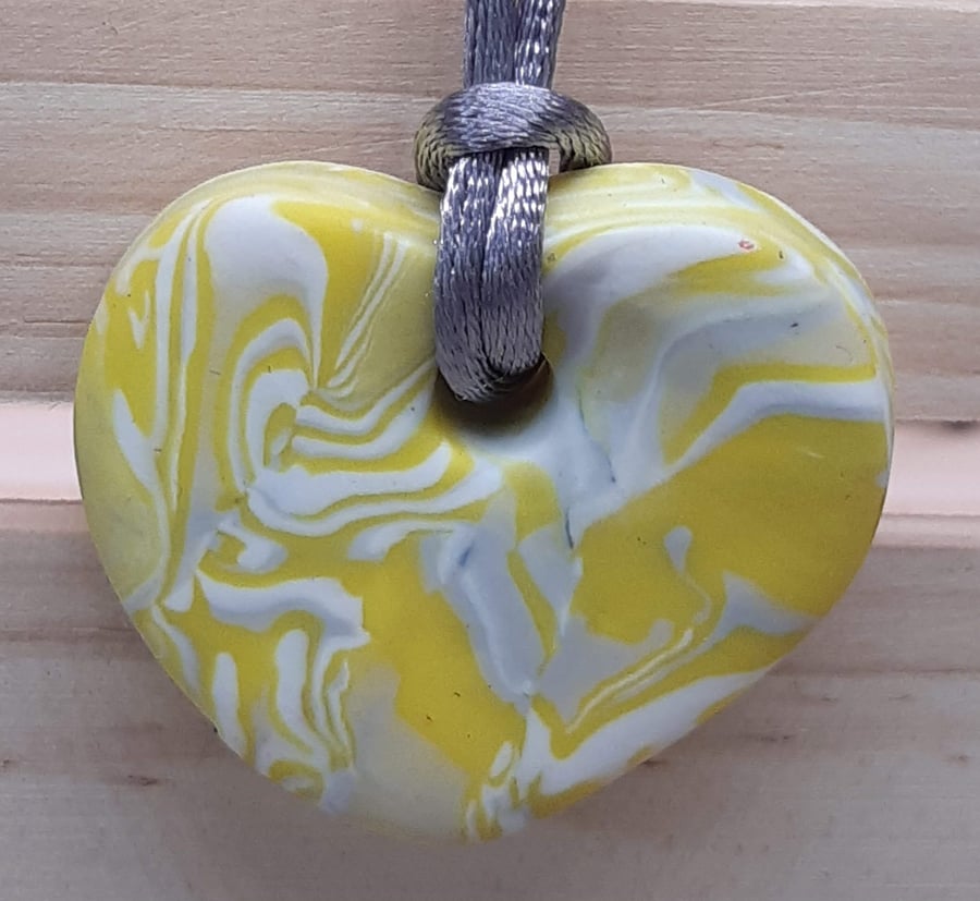 Heart shaped polymer clay pendant