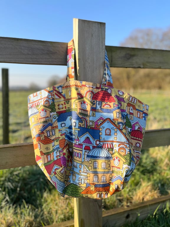 Colourful rooftops cotton beach bag tote bag