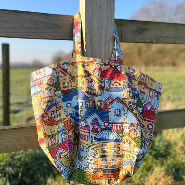Colourful rooftops cotton beach bag tote bag