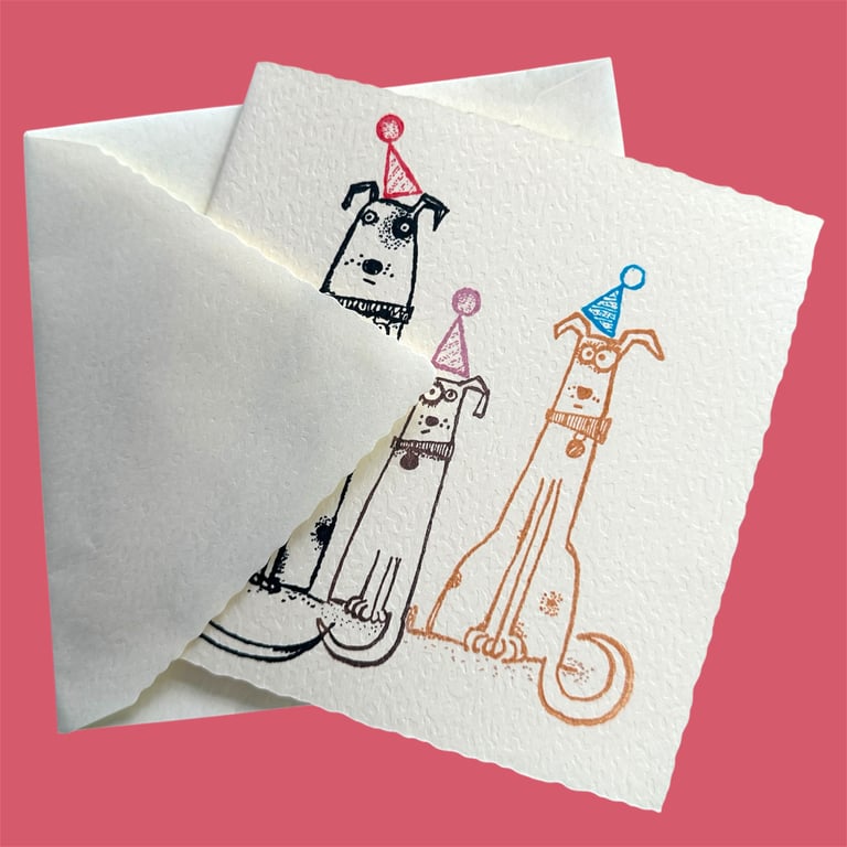 Birthday card with cute dogs in party hats, textured card. 