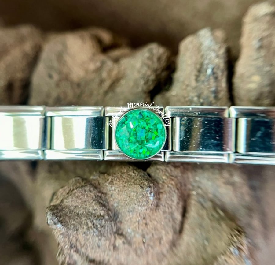 Nomination inspired bracelet charm made with ashes. Stainless steel.  Circular. 