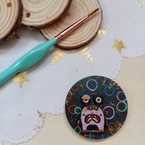 Wooden circular purple monster fridge magnet 