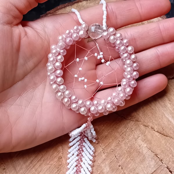Small pink and white beaded feather dreamcatcher