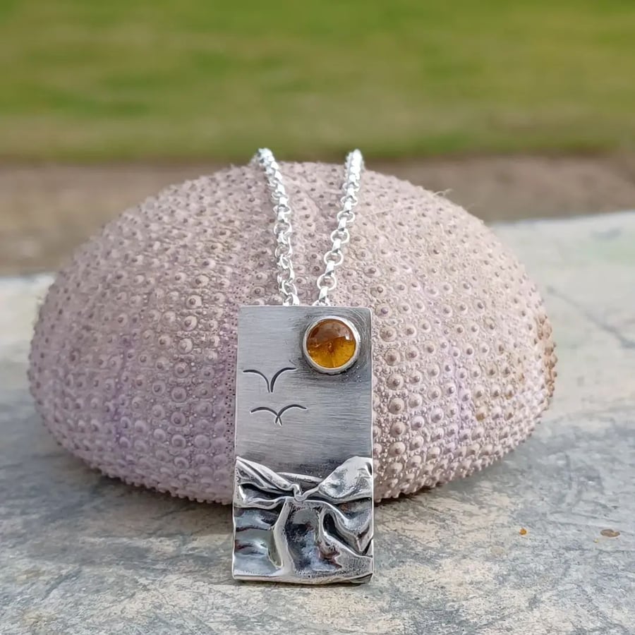 Silver beach, seaside pendant with amber sun and seagulls