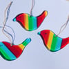 Hanging rainbow birds