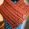 Super chunky crochet snood with buttons.