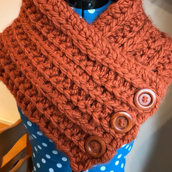 Super chunky crochet snood with buttons.