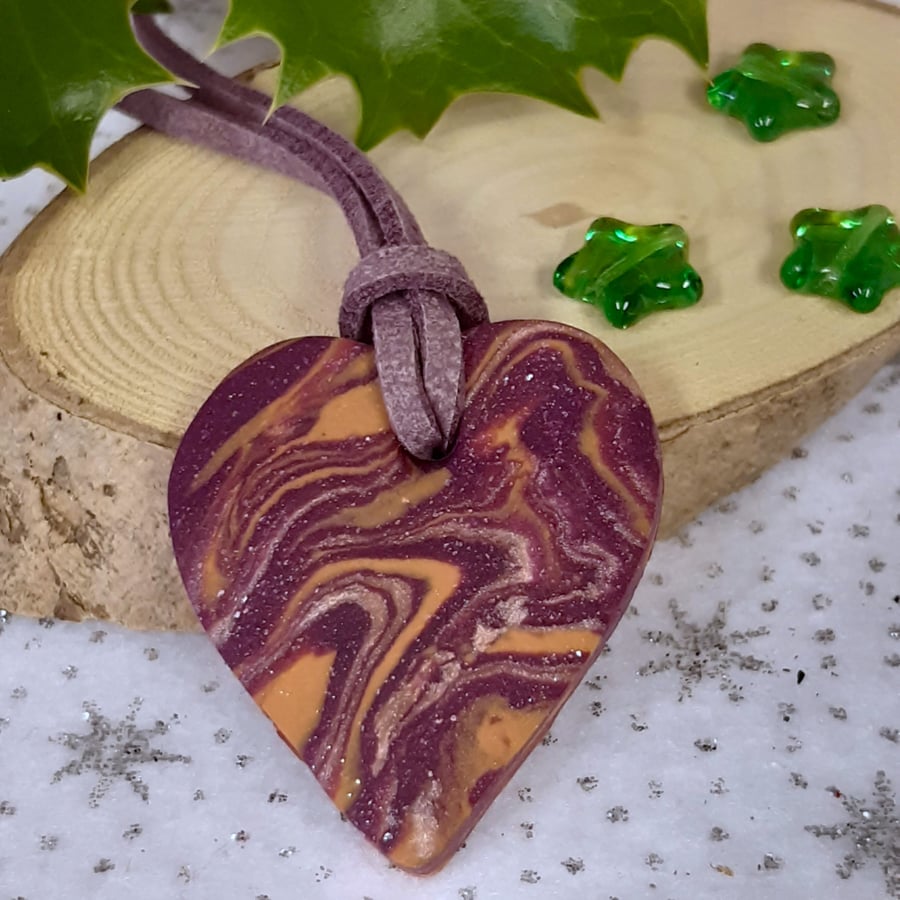 Purple, orange and gold heart shaped pendant