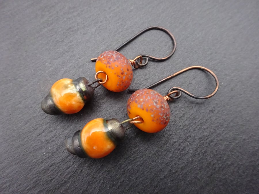 copper, orange lampwork glass and ceramic earrings
