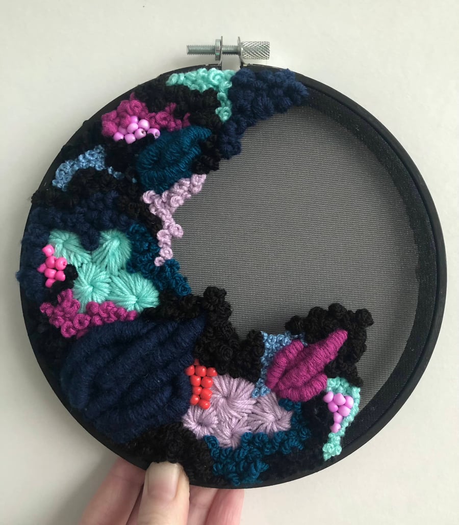 Highlights a 6 inch art embroidery art piece
