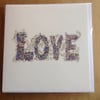 Beautiful card with LOVE written on the front 
