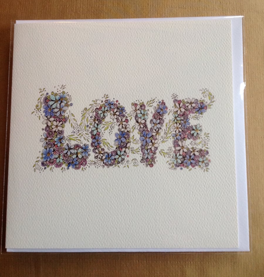 Beautiful card with LOVE written on the front 